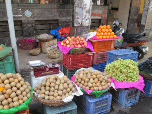 A fruit stall near MG road, you can see the vendor to the right at the back.